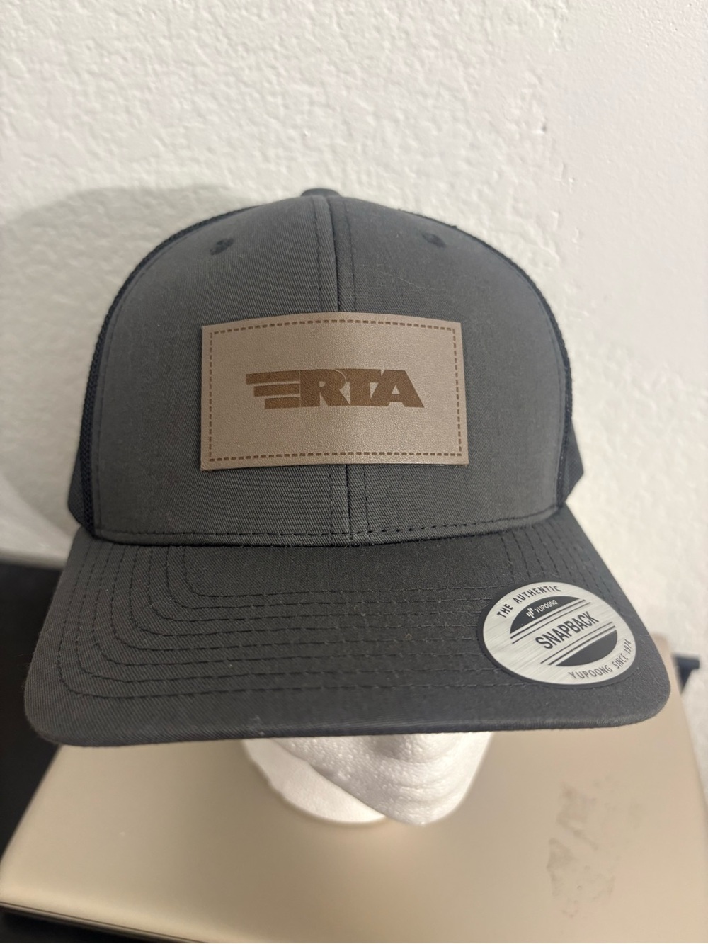 RtA Grey Patch Logo Trucker Cap
